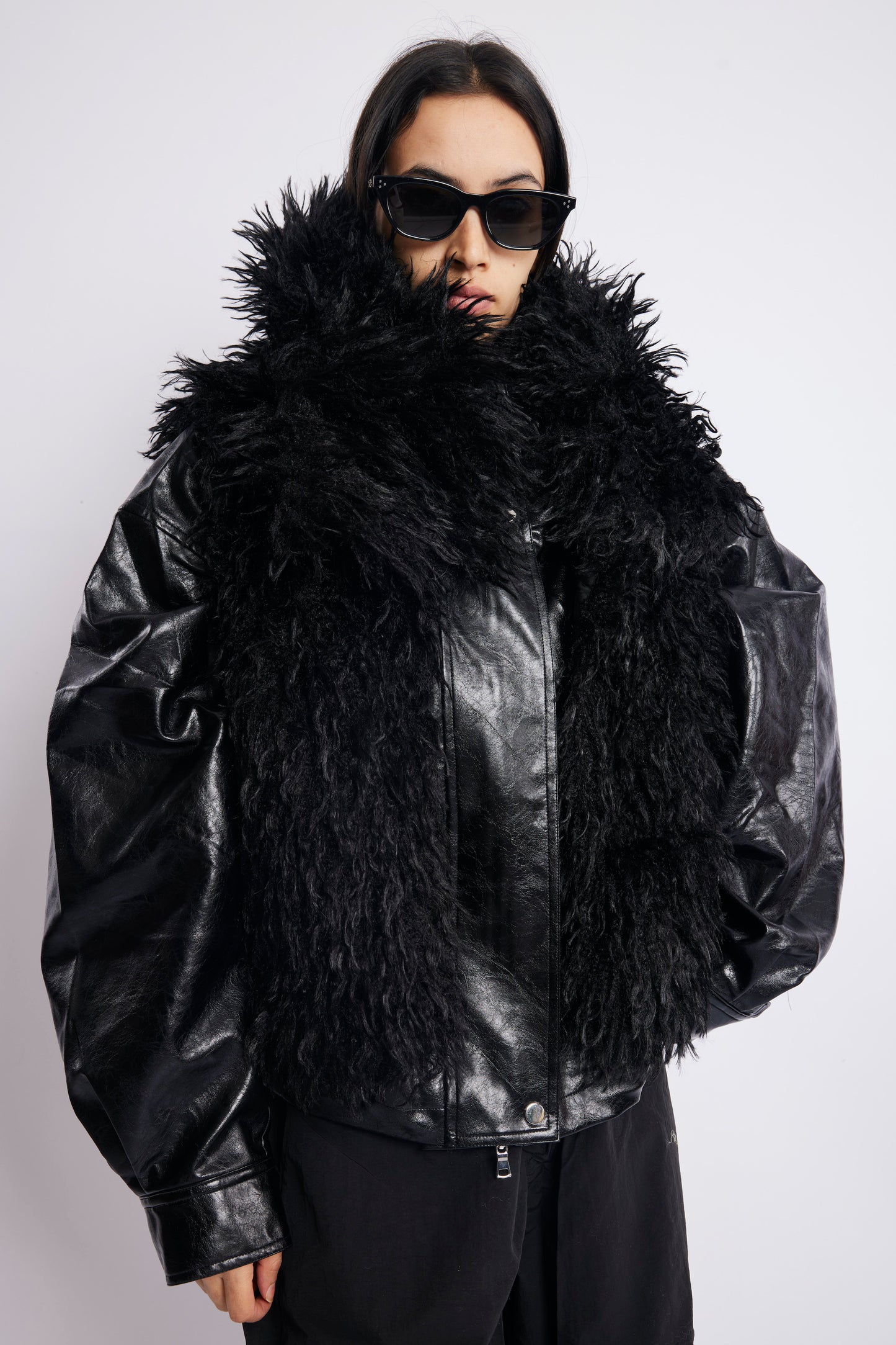 BLACK LEATHER JACKET WITH FUR DETAIL